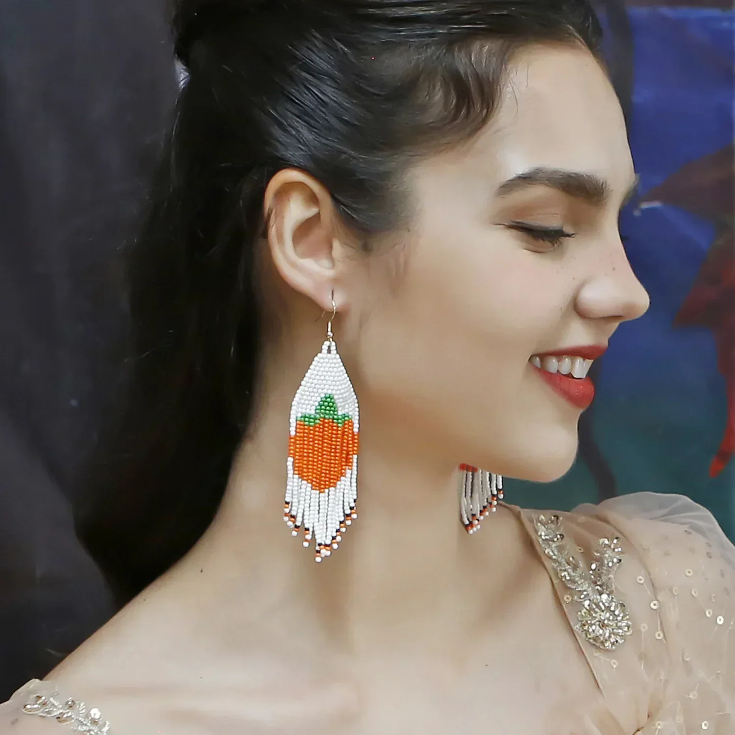 

Rice bead earrings Tassel Design All Saints' Day Originality Bohemia Hand knitting Geometry Female Tide Alloy Beaded earrings