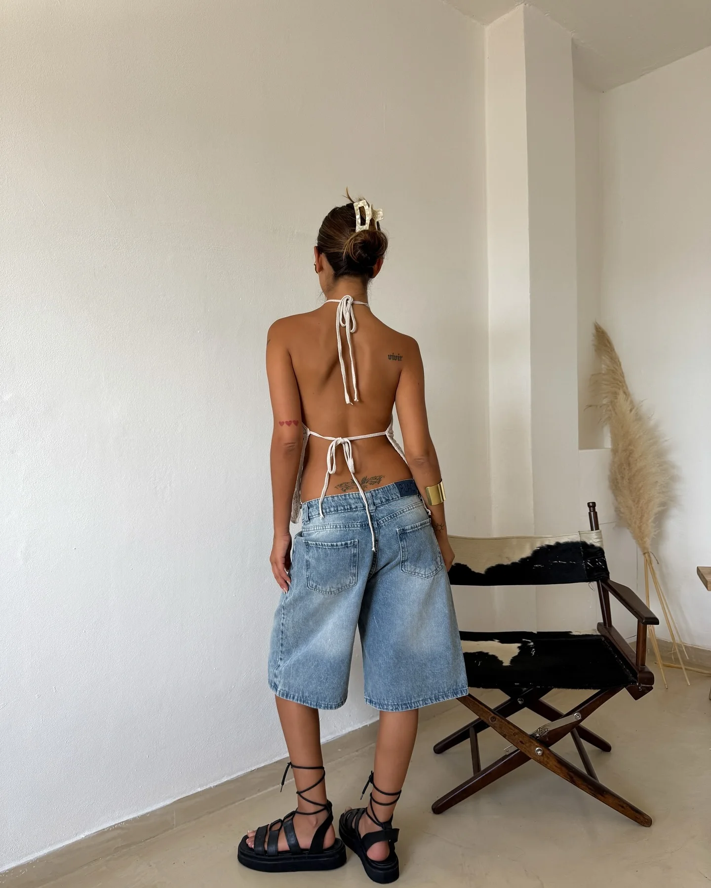 The New Trendy Sleeveless Knitted Vest, a Bohemian Style Sleeveless sexy Fitted Short-Sleeved Crochet Mesh Geometric Texture Top, Features an Opening at The Side, and Has a Loose and Smooth Fit, Making It Suitable for Summer Beach Vacation Outfits.