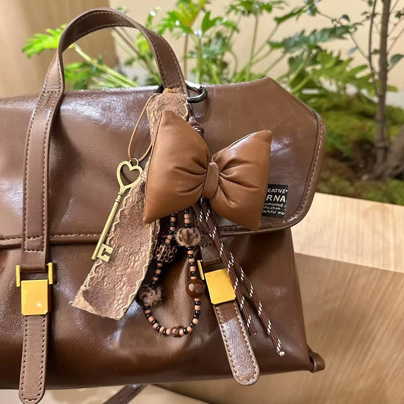 الحلو مبطن الجلود القوس المفاتيح المنظم لطيف حقيبة صغيرة سحر للفتيات الحلو الكورية القوس مفتاح حامل مع قلادة