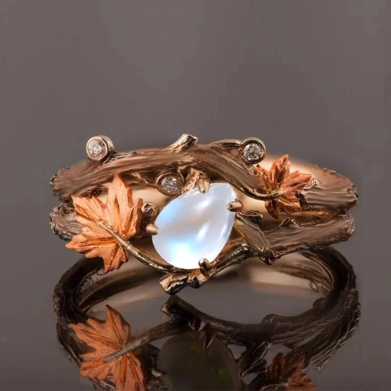 Huitan Vintage Blätter- und Ranken-Design Imitations-Mondstein-Ring für Frauen, Bohemian-Stil, Party, Luxuriöser, Zierlicher CZ Eleganter Fingerschmuck