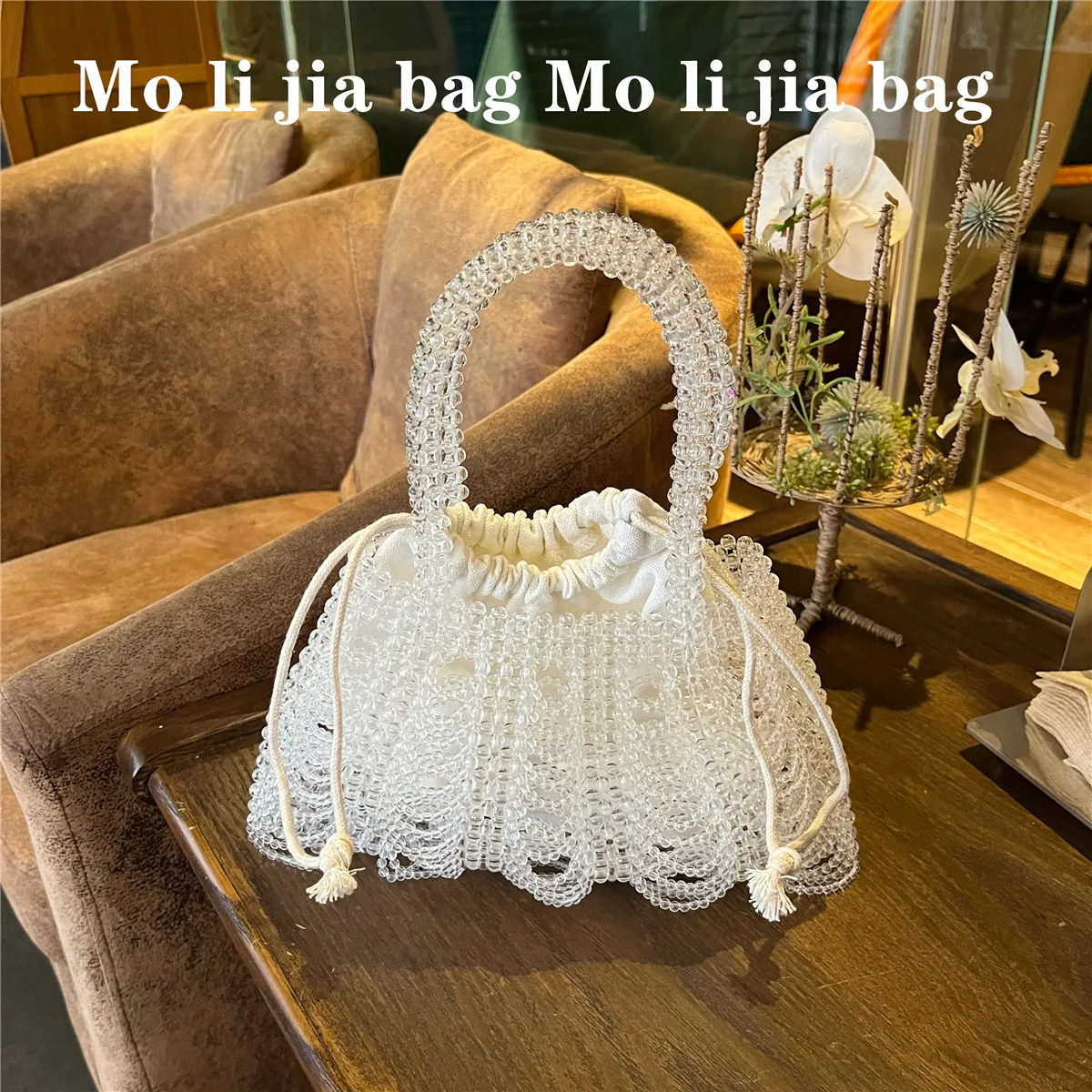 FIRMRANCH Retro French Hollow Wave Tassel Fan Design Handwoven Pearl Bag Transparent Beaded Women's Handheld Banquet Purse Hobos