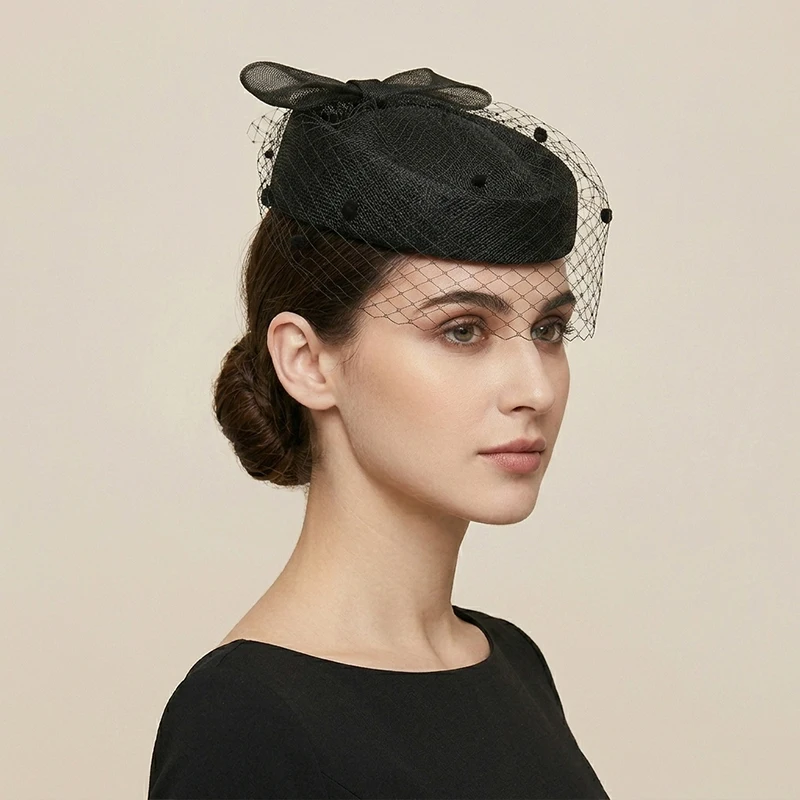 エレガントな黒のピルボックスハット女性用シナメイファシネーターウェディング教会パーティーヘッドピースヴィンテージベールメッシュボウカクテルベレー帽