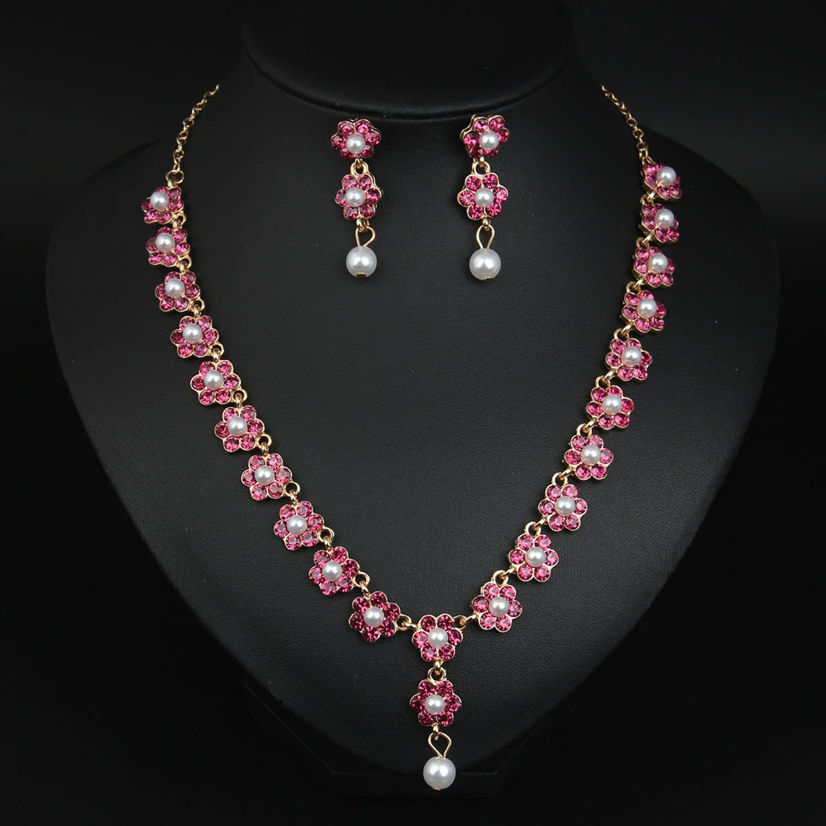 

Stainless steel water-drop pearl flower necklace and earrings set. High-quality waterproof jewelry. Birthday gift