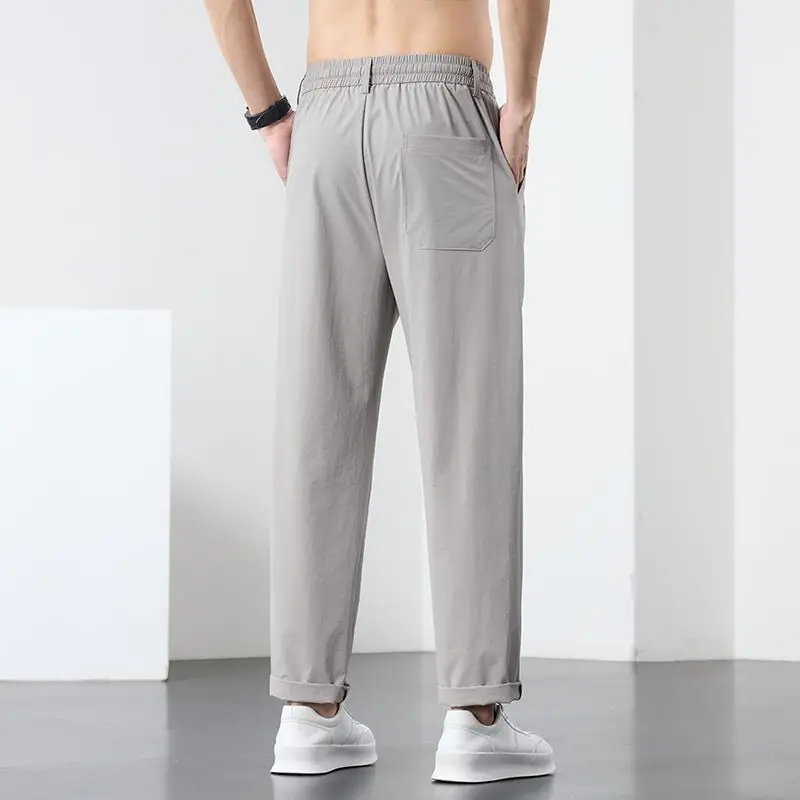 ربيع صيف جديد الحرير الجليد سريعة الجافة السراويل تنفس مريحة بناطيل كاجوال الرجال النساء