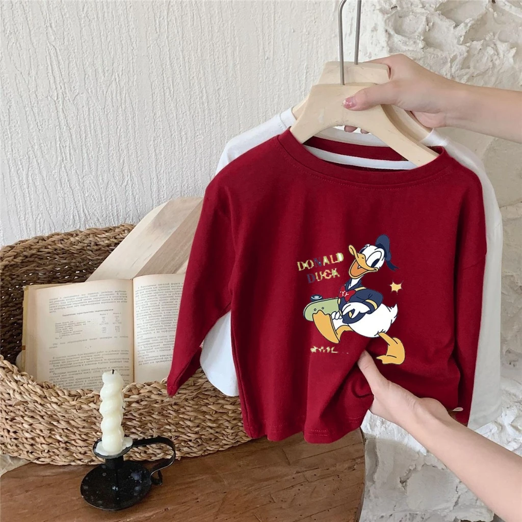 

Новое поступление, детские футболки с длинными рукавами и принтом Дональда Дака, разноцветные милые повседневные футболки с героями мультфильмов для детей, модные футболки для девочек и мальчиков