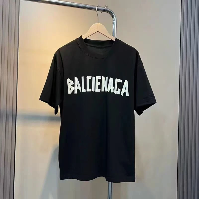 Camiseta de primavera y verano para hombre, tendencia americana, letras compensadas, red de grafiti, pareja roja, pantalón corto holgado informal de manga