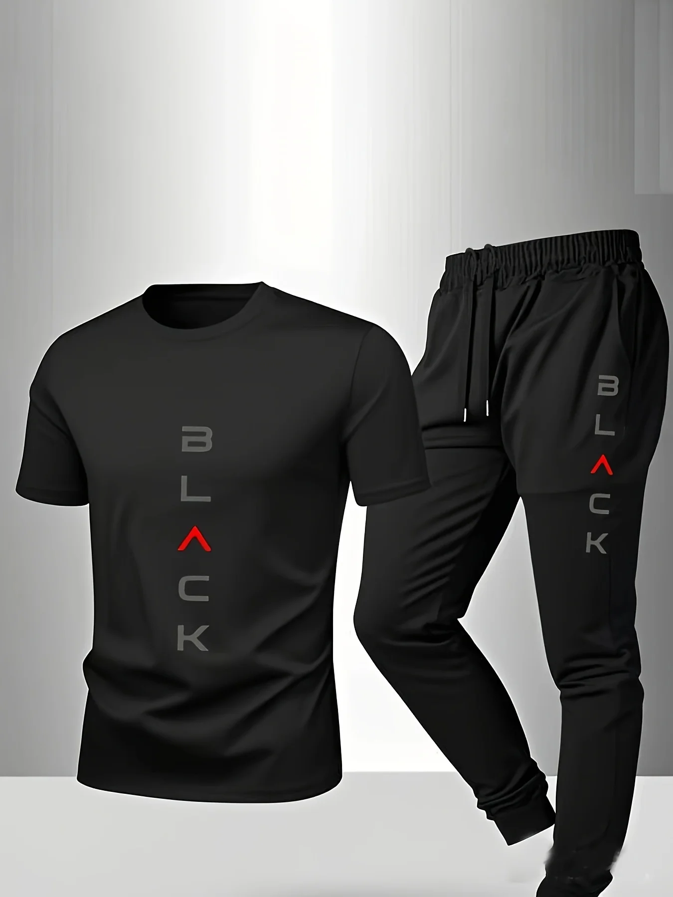 

Мужской спортивный костюм из быстросохнущей ткани, включающий футболку с коротким рукавом и длинные брюки, для фитнеса.