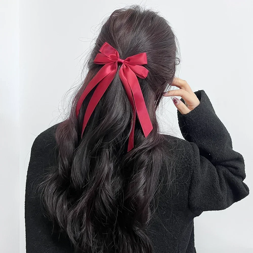 Elegant Bowknot Ribbon Hair Clip para Mulheres, Long Tassel, Ponytail Clip, Party Headwear, Acessórios de Moda, 2pcs por conjunto