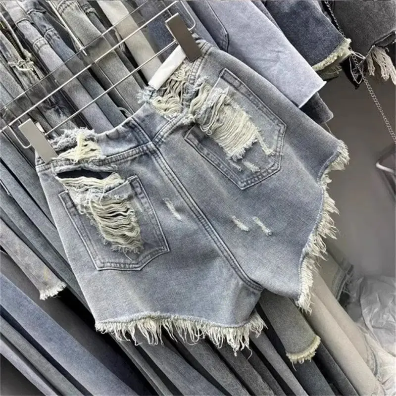 

Women New Design Of light-Colored Ripped Denim shorts, sexy Hot Girl Loose And Slimming Wide-leg A-Line Hot Pants Shorts Jeans