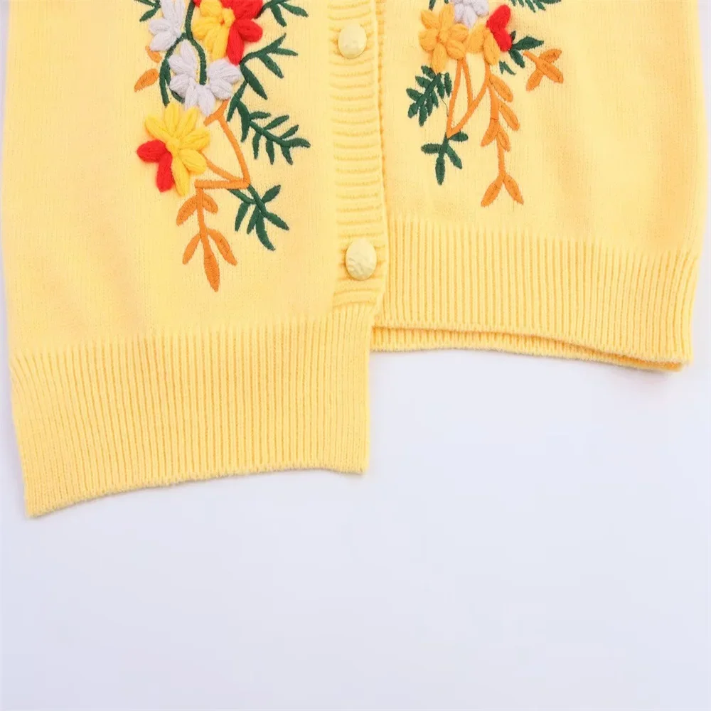 2025 Nuovi abiti da donna Cardigan con orlo irregolare ricamato semplice e versatile alla moda in stile europeo e americano