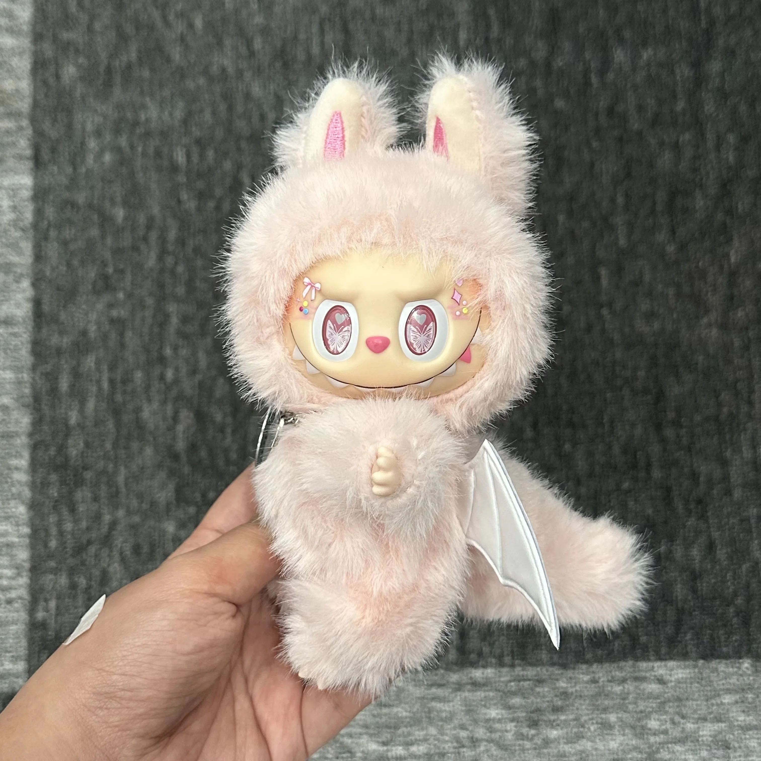 

2025 High Quality Monster Labubu Serie Pink Angel Zimomo Vinyl Face Doll Butterfly Eye Cute Blind Box Ornament Toy Holiday Gifts
