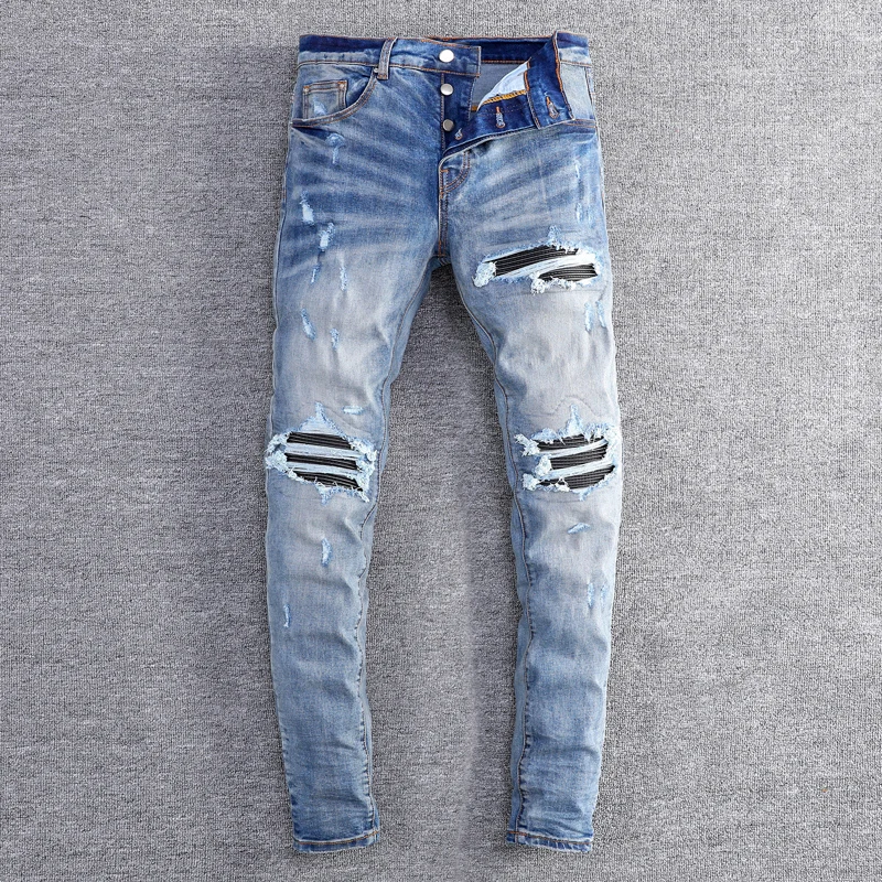 Fashionable new men's jeans with water washed elastic slim fit patchwork patch. Retro blue jeans from high street hip-hop brand