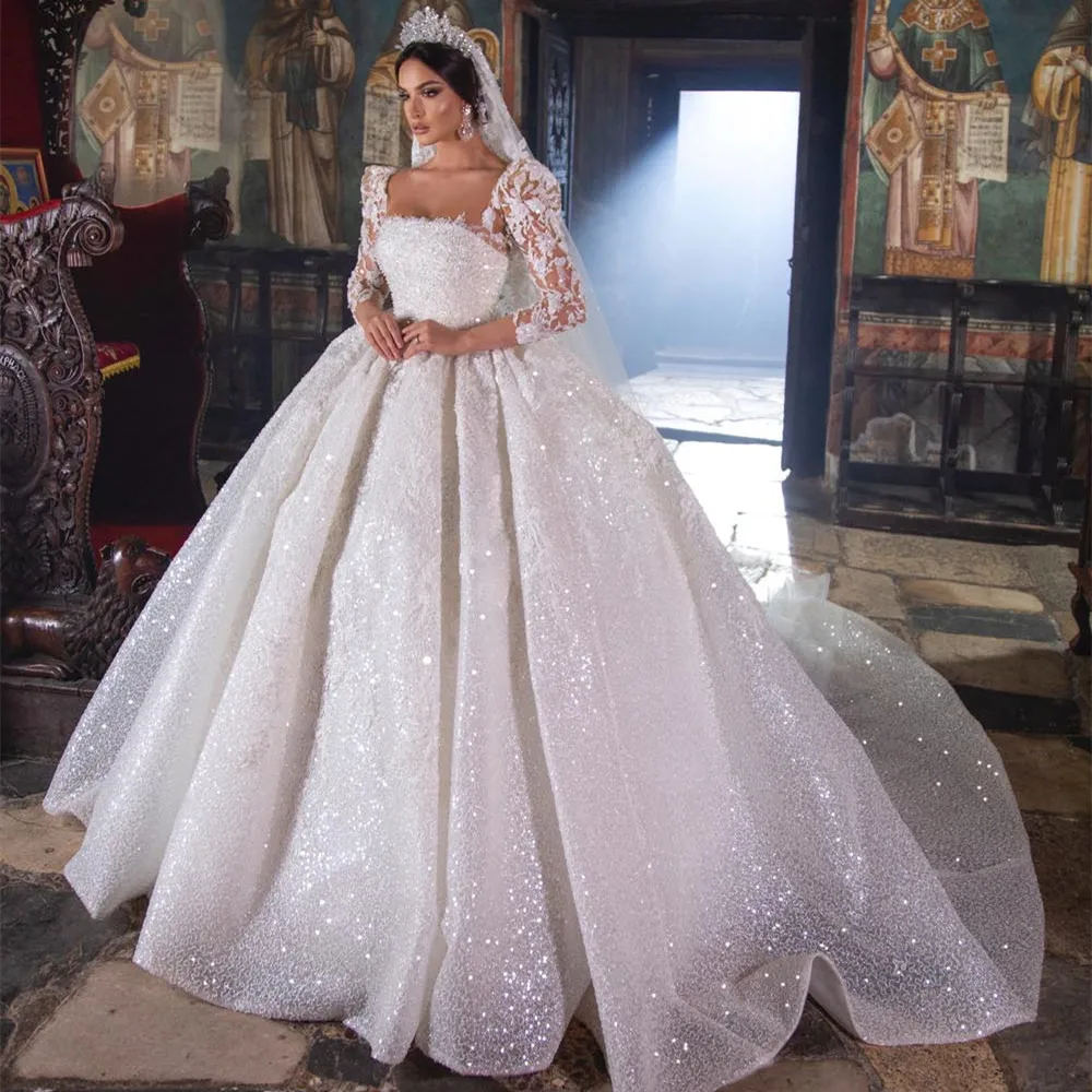 

Stunning Sparkly Wedding Dresses Princess Ball Gown Puff 3/4 Sleeves Lace Dubai Bridal Gowns Square Neck Pearls Robe De Mariee