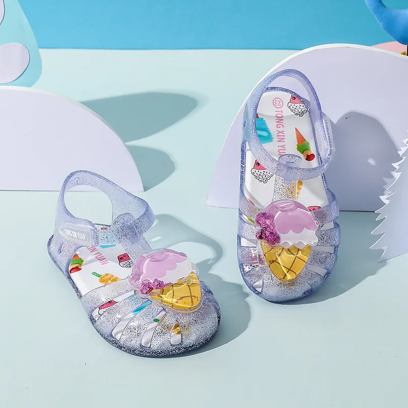 Sandali per ragazze estate principessa 2024 nuovi bambini gelato anguria ciambella scarpe da spiaggia Baby Baotou Jelly Shoes scarpe di cristallo