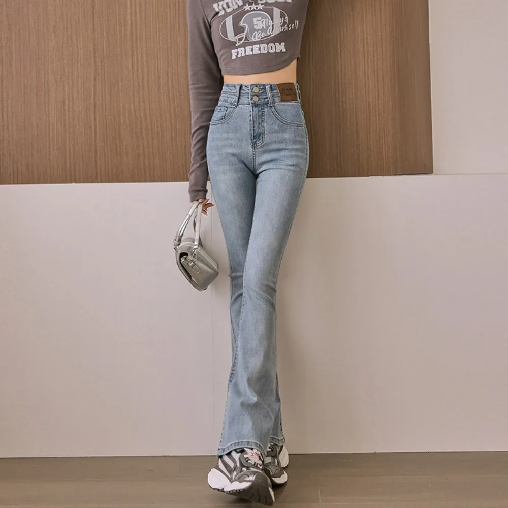 กางเกงยีนส์ทรงบลูมสำหรับผู้หญิง เอวกลาง ทรงบอยเฟรนด์ ผ้ายืด กระดุมผ่าหน้า ทรงบูทคัท ดีไซน์ทันสมัยปี 2025