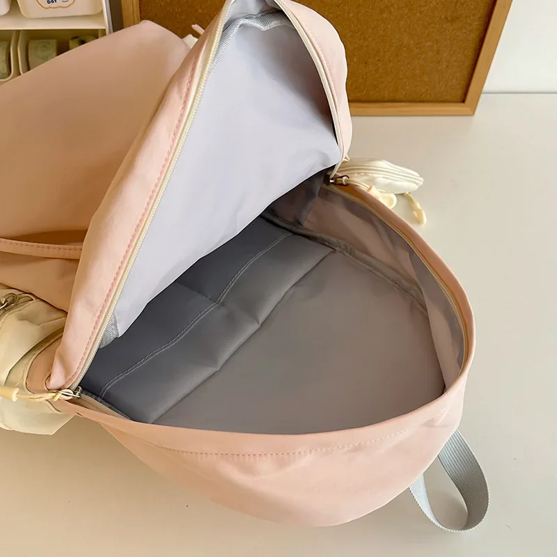 Mochila escolar ligera de gran capacidad para mujer, bolso de hombro impermeable con lazo bonito para estudiante universitario