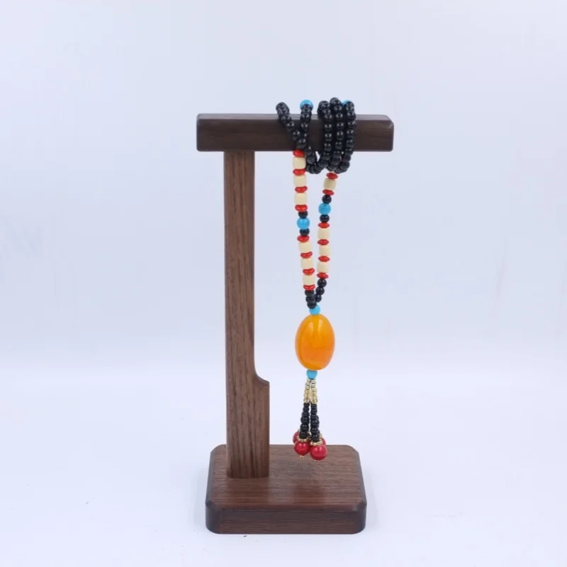 แผ่นไม้วอลนัทสีดำขาตั้งหูฟังอเนกประสงค์สำหรับนักเล่นเกมหูฟังเกมเครื่องประดับฐานแบบหนา