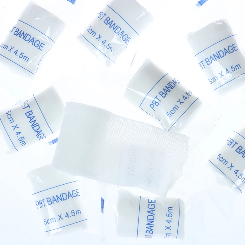 PBT مطاطا ضمادة الإسعافات الأولية ، الشاش لفة خلع الملابس ، 5 سنتيمتر x 4.5 م ، 10 لفات لكل مجموعة