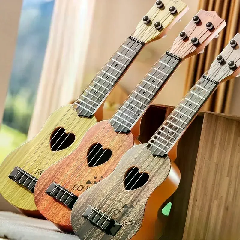 لعبة جيتار يوكريلي للأطفال، تعليمية وتعلمية، تتميز بـ 4 أوتار ومجاذيف، مقاس 26/35 سم.