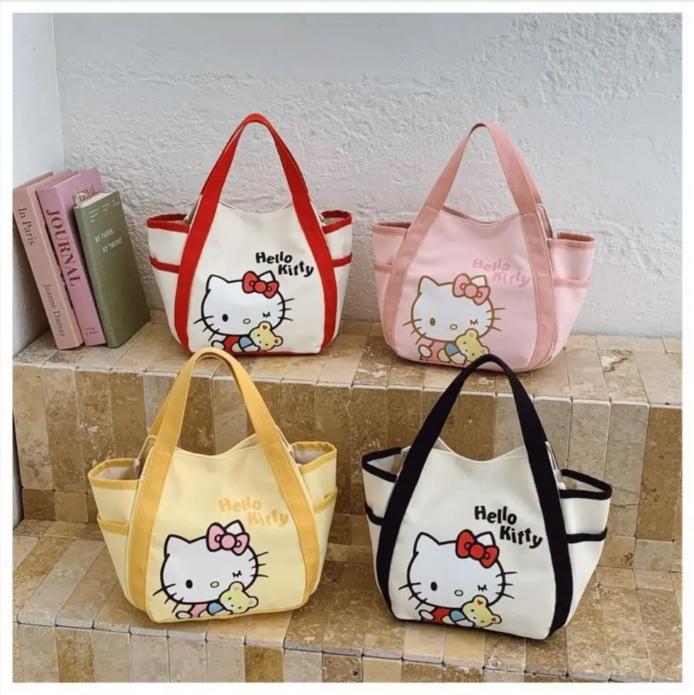 

Women Hello Kitty Canvas Bag Lunch Bag Cute Cartoon Shoulder Handbag with Button Large Capacity Soft Commute Tote Gifts