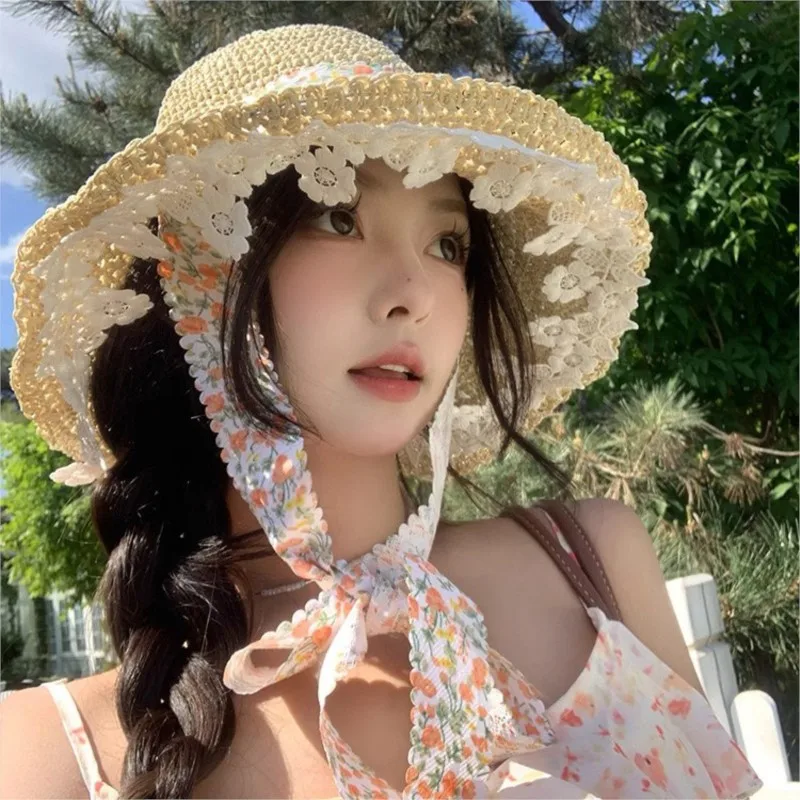 Hepburn style floral ribbon woven hat women's summer large brim hollowed-out breathable sunshade