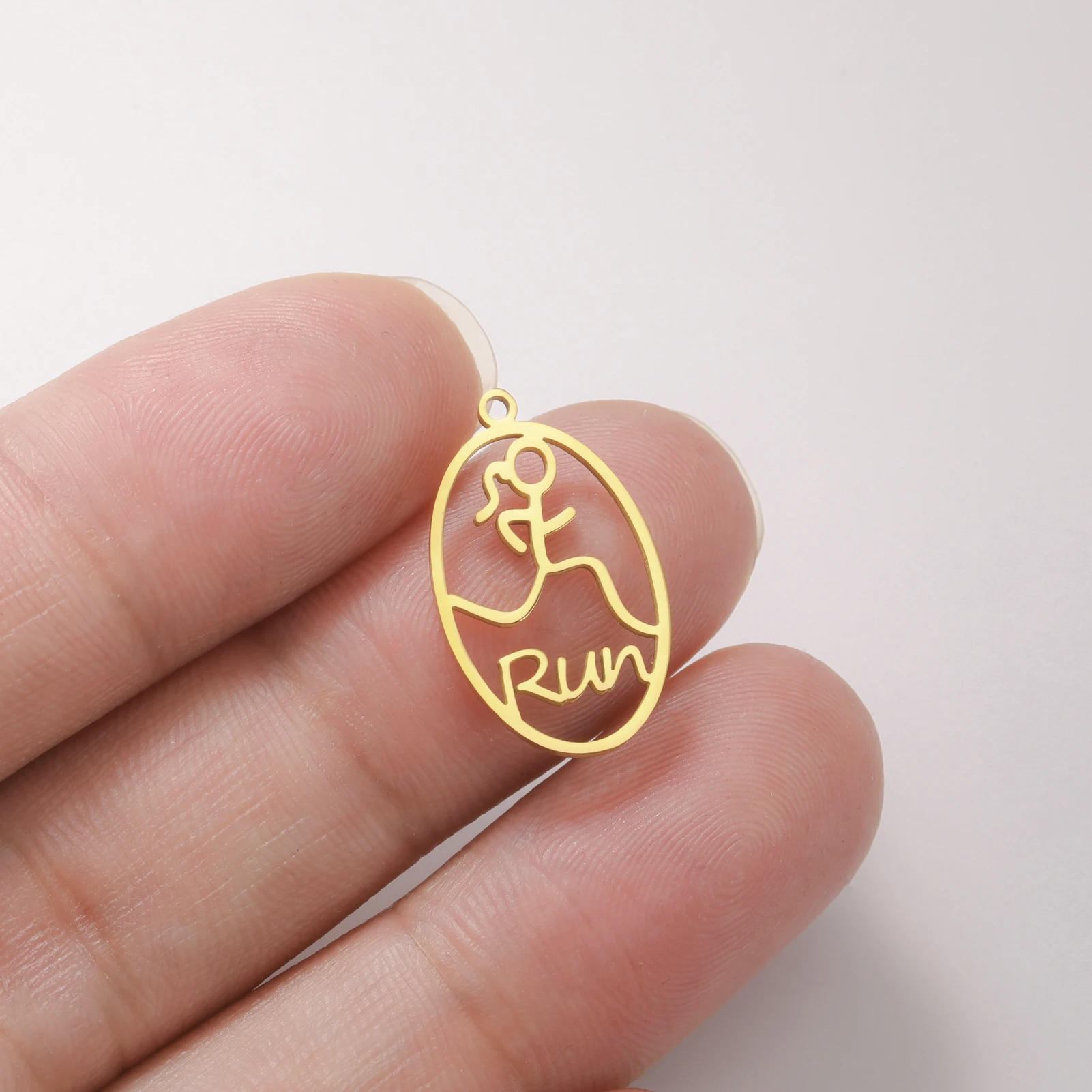 Little man running pattern pendant oval stainless steel boutique gift