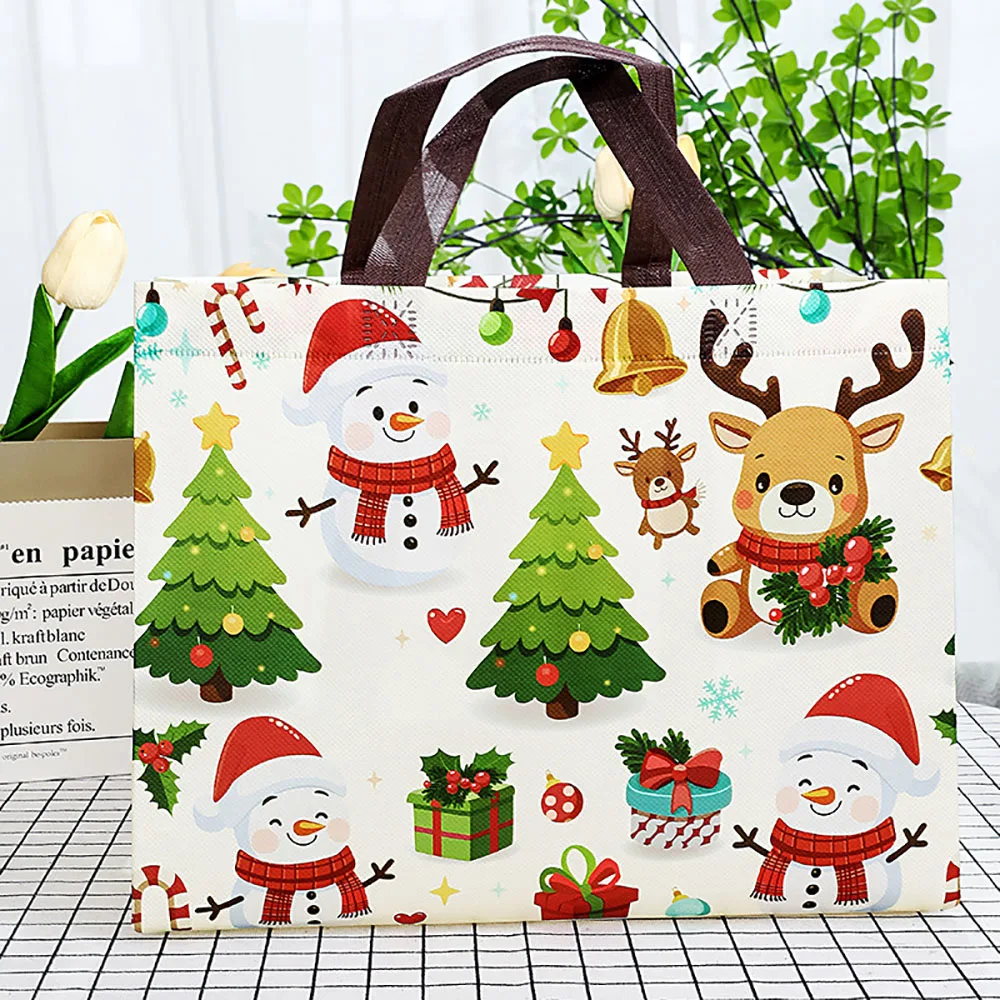 هدية عيد الميلاد حقيبة غير المنسوجة سانتا ثلج شجرة عيد الميلاد حمل التعبئة والتغليف الحقيبة مقاوم للماء حقيبة يد للتسوق عيد الميلاد السنة الجديدة أكياس الحلوى