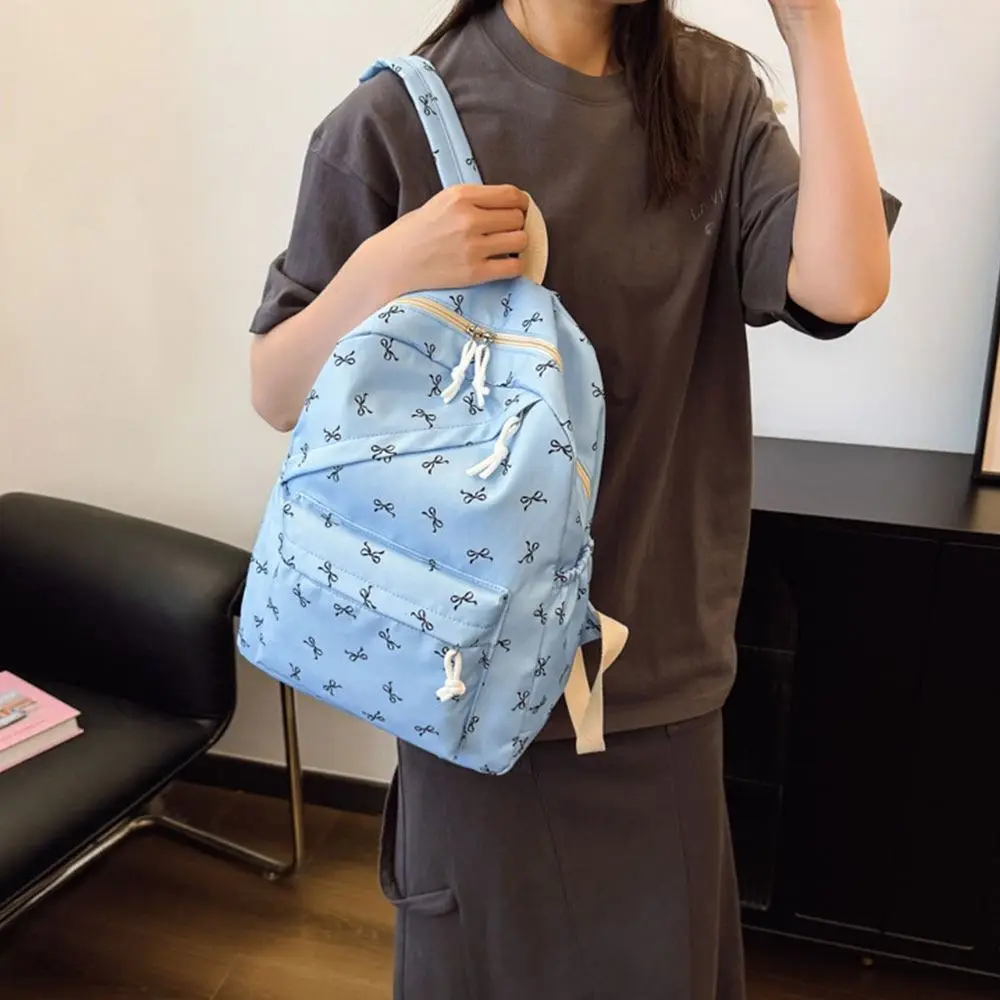 حقيبة مدرسية محمولة للطلاب مطبوعة على شكل فيونكة من النايلون بسعة كبيرة