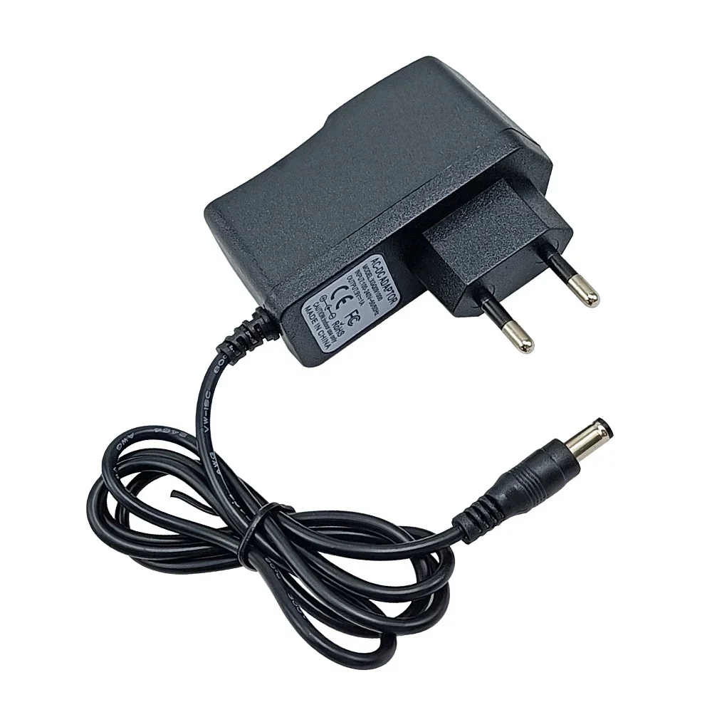 Adaptador de fuente de alimentación para Pedal de guitarra DC 9V 1A, piezas de guitarra para instrumento Musical negro AC para Pedal de efectos, enchufe europeo