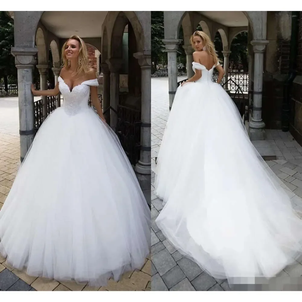 Robes de mariée en tulle avec appliques en dentelle, robes de train de balayage, grande taille, sur mesure, élégantes, lancées