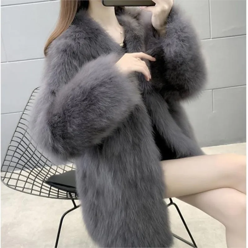 

Women's fur mid-length mixed coat with a large collar