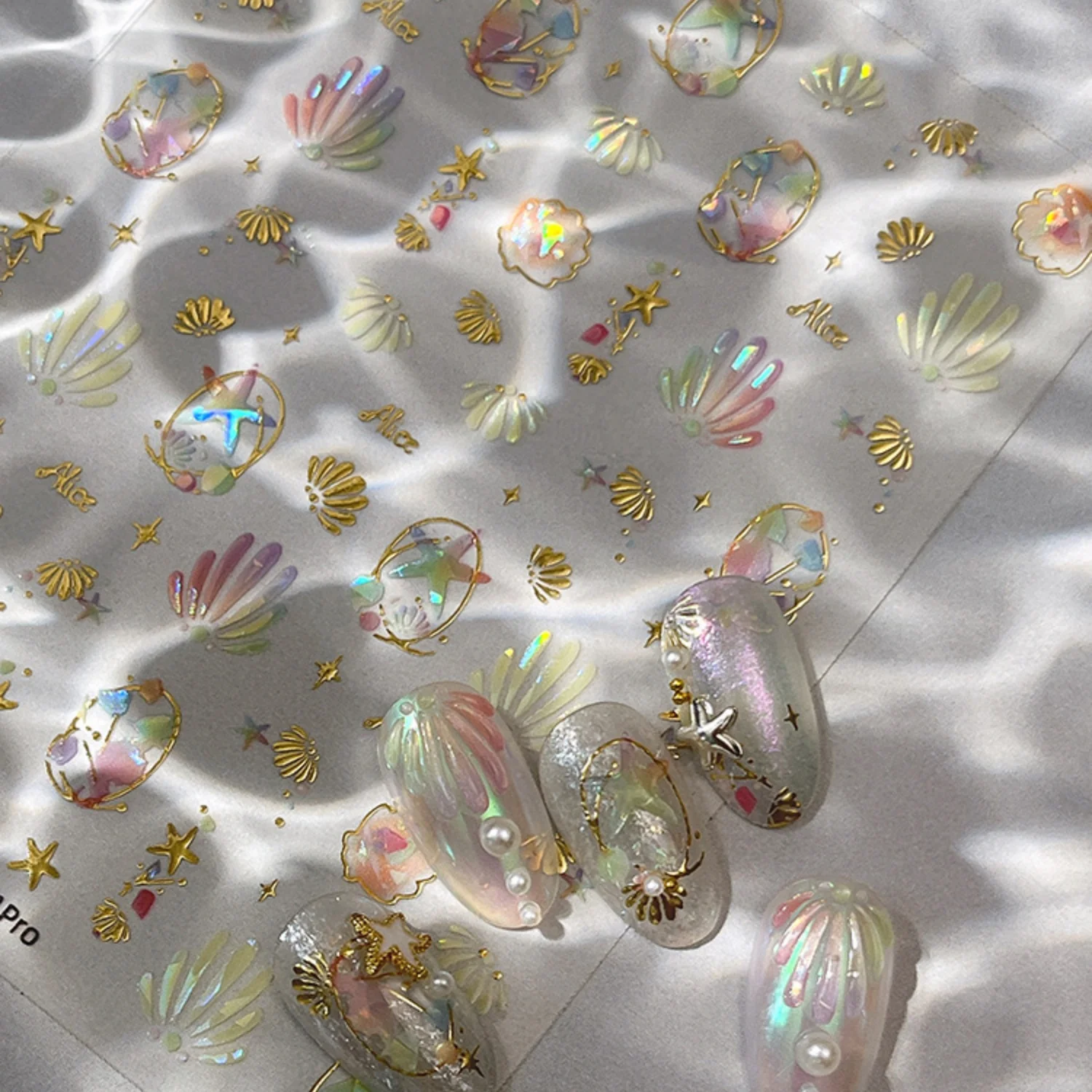 Muschel Mini-Seestern 5D Nagelaufkleber Imitierte Edelsteine Ovale Abziehbilder Glänzende Holographische Ozean Selbstklebende Sommer-Dekorationen für Maniküre