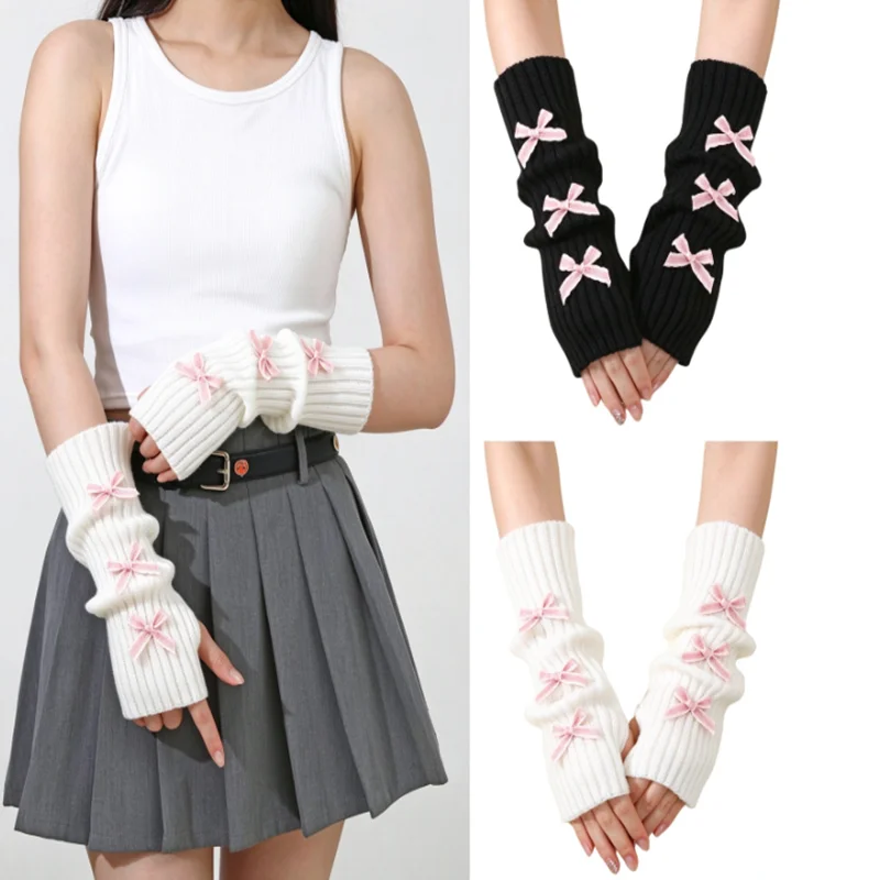 A pair of ladies' 30cm bow tie winter warm gloves. Long knitted puff sleeves for an academic style. Fashionable gloves