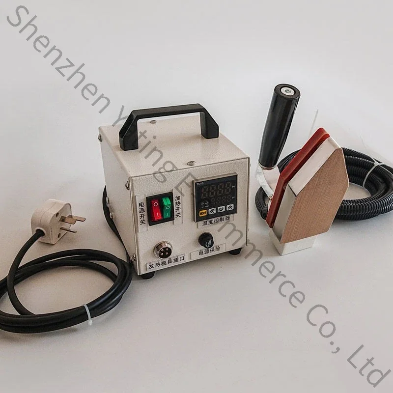 Handheld positioning iron—equipment for hot-melt positioning and pressing in seamless garment manufacturing.