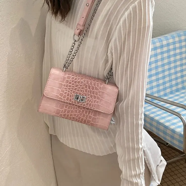 

Практичная и стильная сумка для подгузников для женщин, элегантная сумка через плечо, дизайнерская кожаная сумка-тоут, минималистичный винтажный стиль, однотонная.