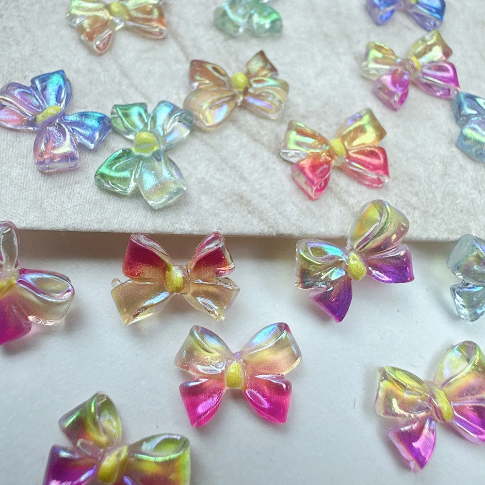 100 pezzi/pacco 2026 ciondoli per unghie con fiocco in resina iridescente - Aurora Butterfly Nail Art, decorazione per unghie a pressione futuristica per manicure fai da te