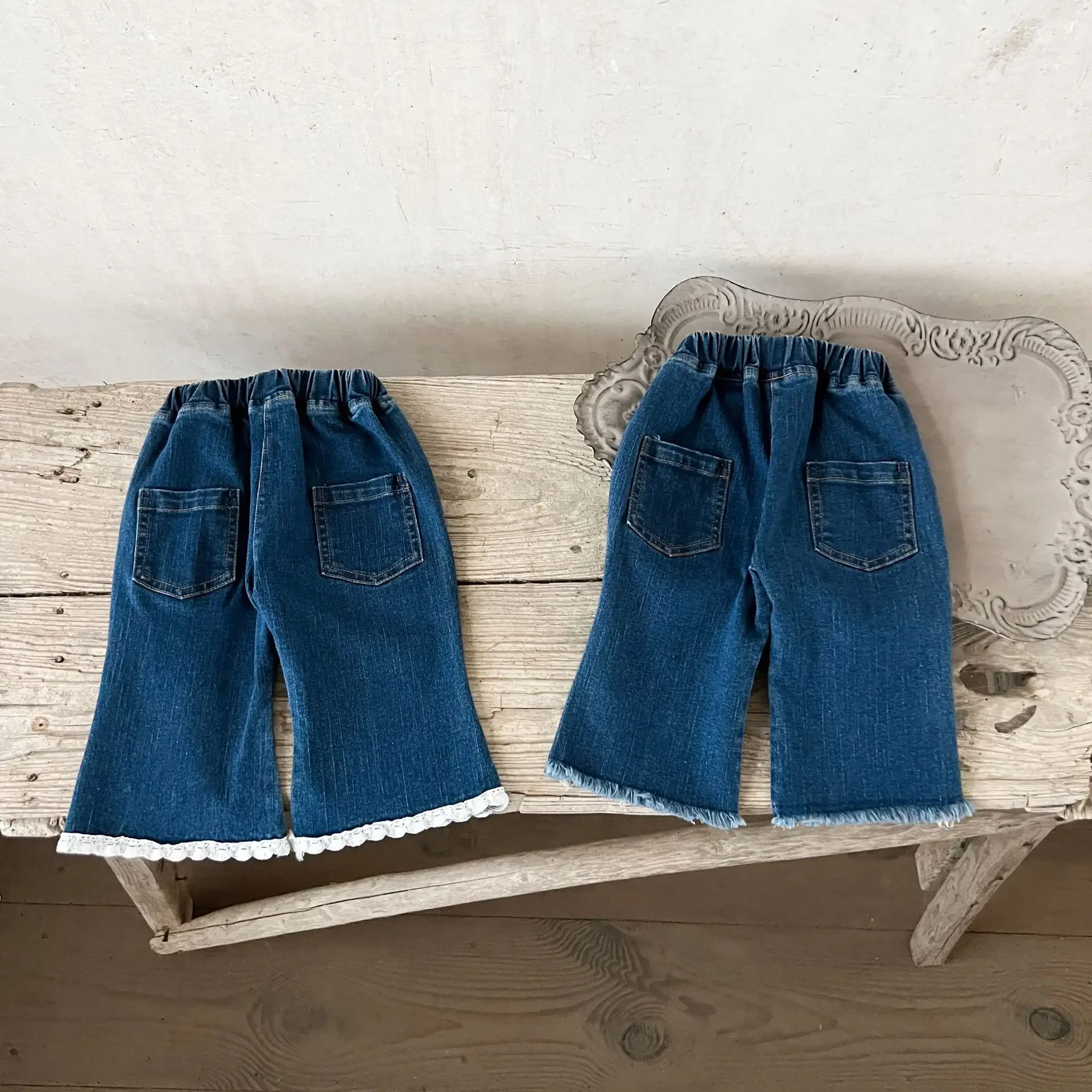 Vestiti del bambino tinta unita semplice pizzo Denim Flare pantaloni 2024 primavera e autunno nuove ragazze moda bambino Casual tutti i Jeans abbinati