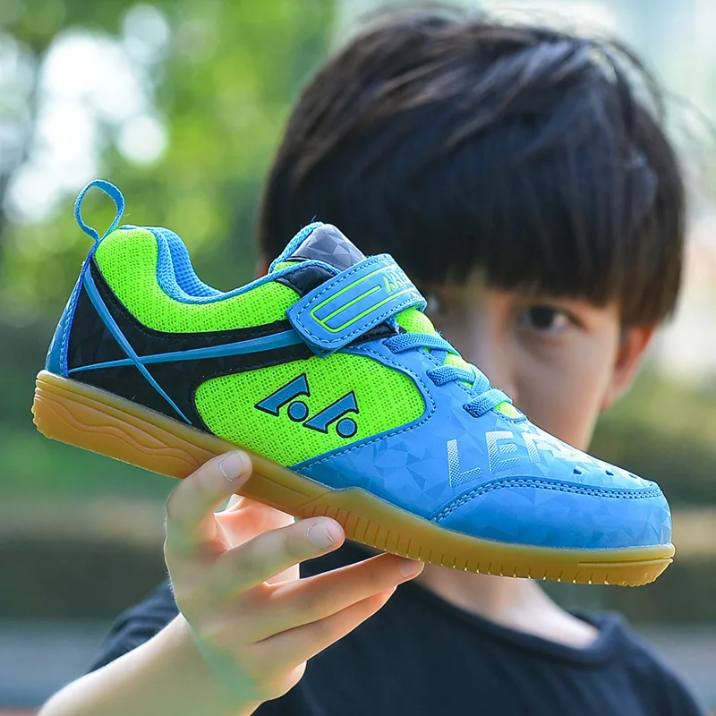 2025 zapatos de tenis de mesa para niños, zapatos de bádminton antideslizantes Unisex con diseño de bucle de gancho, zapatos de cancha interior, zapatos de balonmano de diseñador