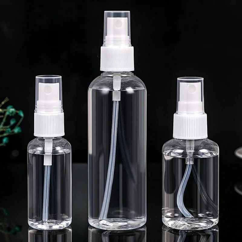 NWE Travel dispenser bottle transparent cosmetic perfume alcohol portable plastic pressed small spray bottle sterilization