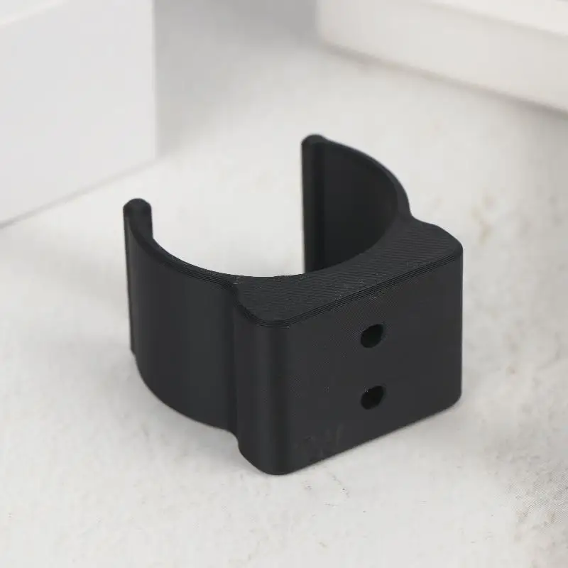 Vacuum Cleaner Accessory; 40mm Diameter Mounting Bracket in Solid Black Plastic.