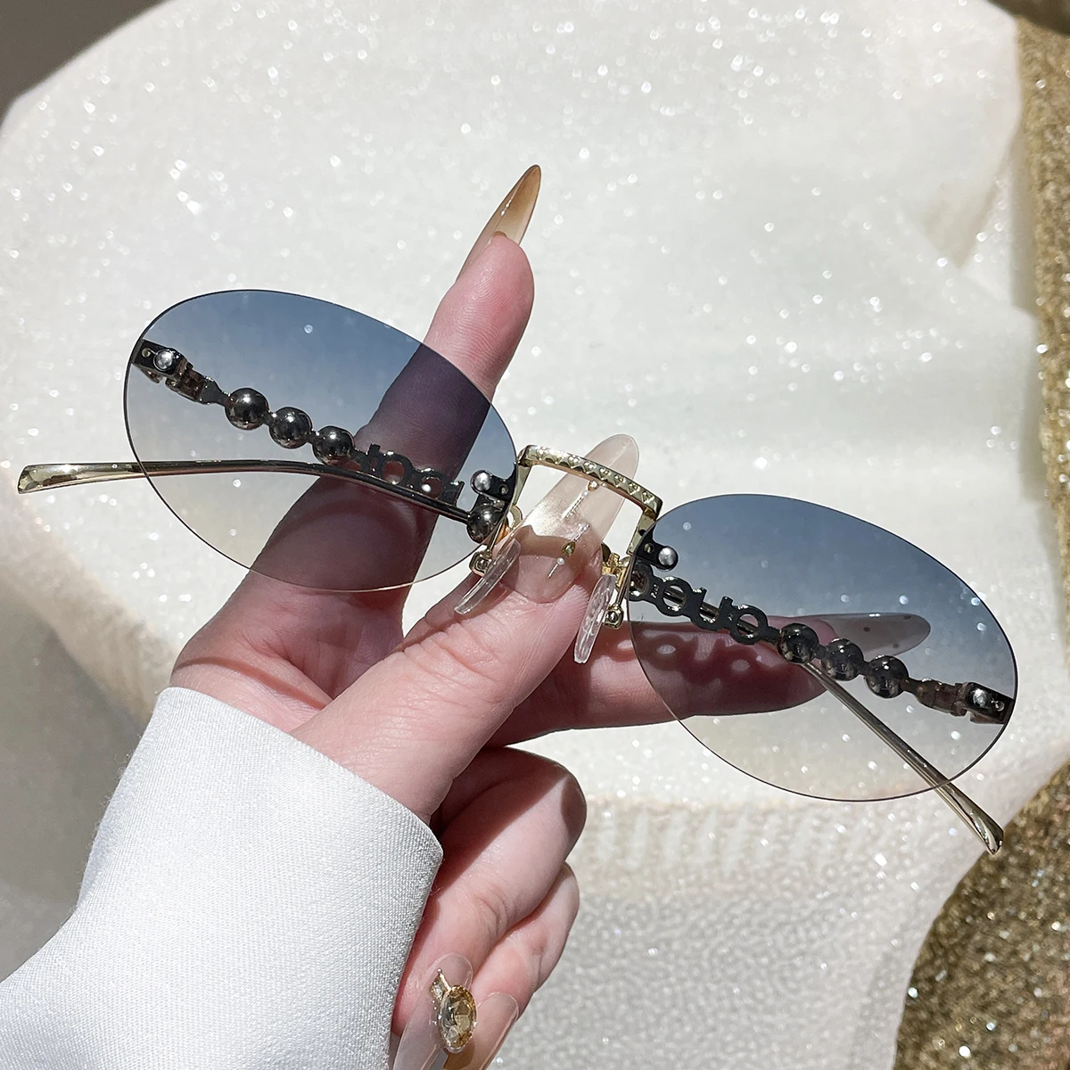 1 Stück Damen-Sonnenbrille Neuer Stil Perlen-Bügel Runde Rahmenlose Sonnenbrille Persönlichkeit Modisch Lässig Vielseitig Trendy Street