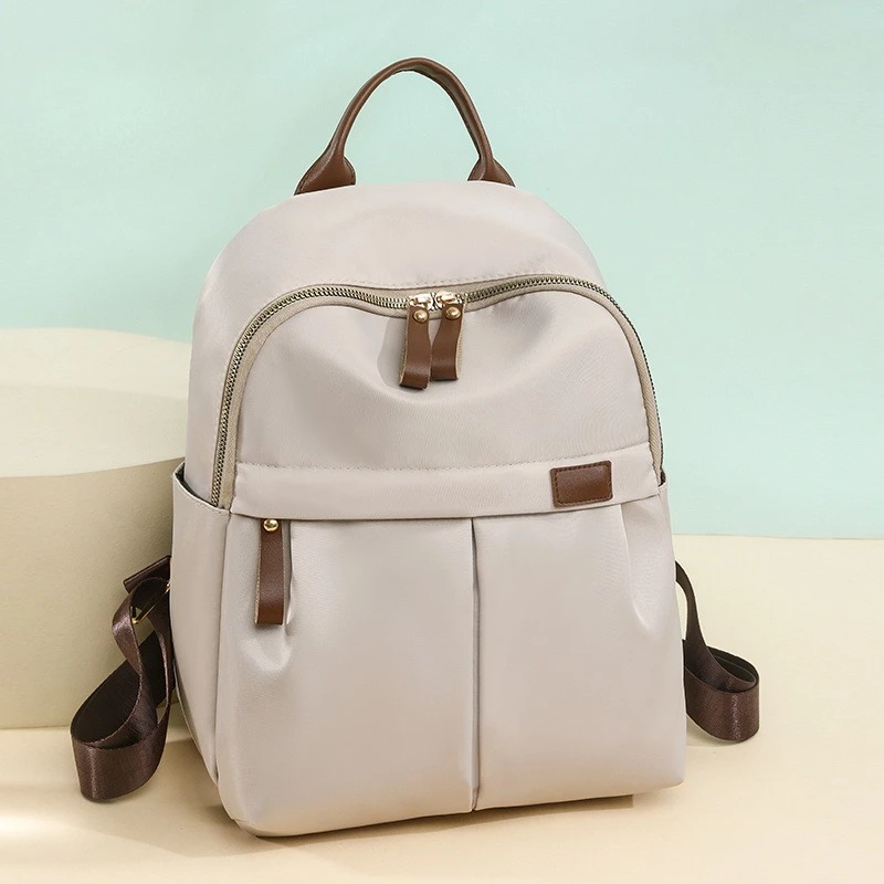 

European and American fashion backpack women's new commuter short-distance travel Oxford cloth backpack light student bag