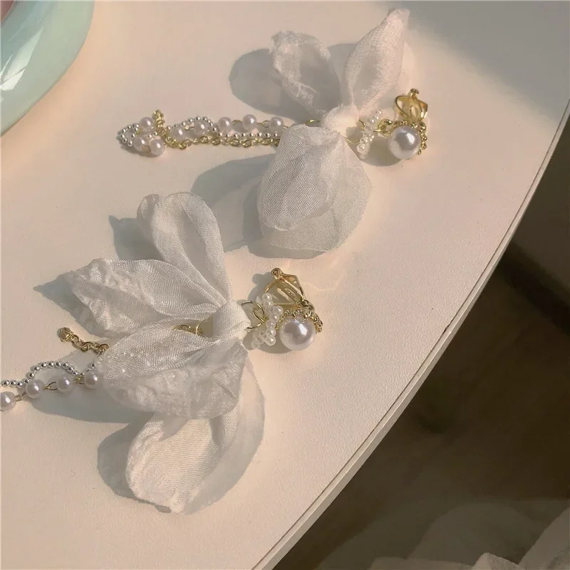 خمر هونغ كونغ نمط ضوء الفاخرة الأذن كليب الملحقات الفرنسية الأبيض القوس قرط كبس طويل اللؤلؤ شرابة الأقراط للنساء #6