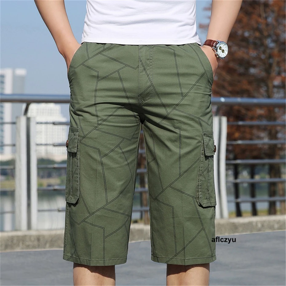 Calça cargo casual com elástico na cintura masculina, comprimento de bezerro, reta, design de linha, plus size, 6XL, moda masculina