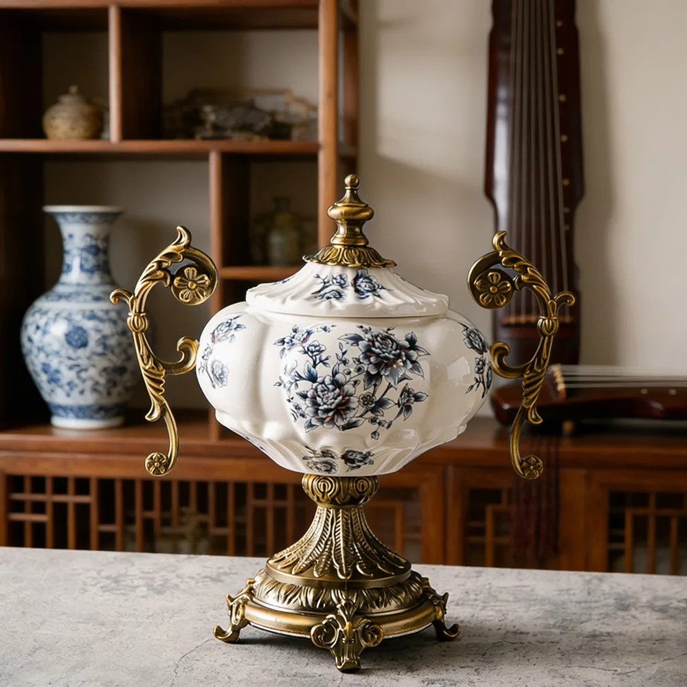 Vintage Style Lidded Ceramic Decorative Jar with Blue Floral Pattern, Ornate Metal Handles and Base, Home Decoration