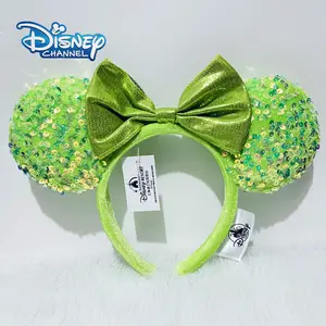 Disney offers Parks Mint Green Sequin Minnie Mouse Satin Bow Ear Headband Pastel Green