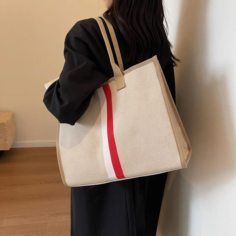 Bolso de hombro de lona de gran capacidad para mujer, bolso de viaje diario, diseño Simple, estética, estudiante, tendencia informal, combina con todo