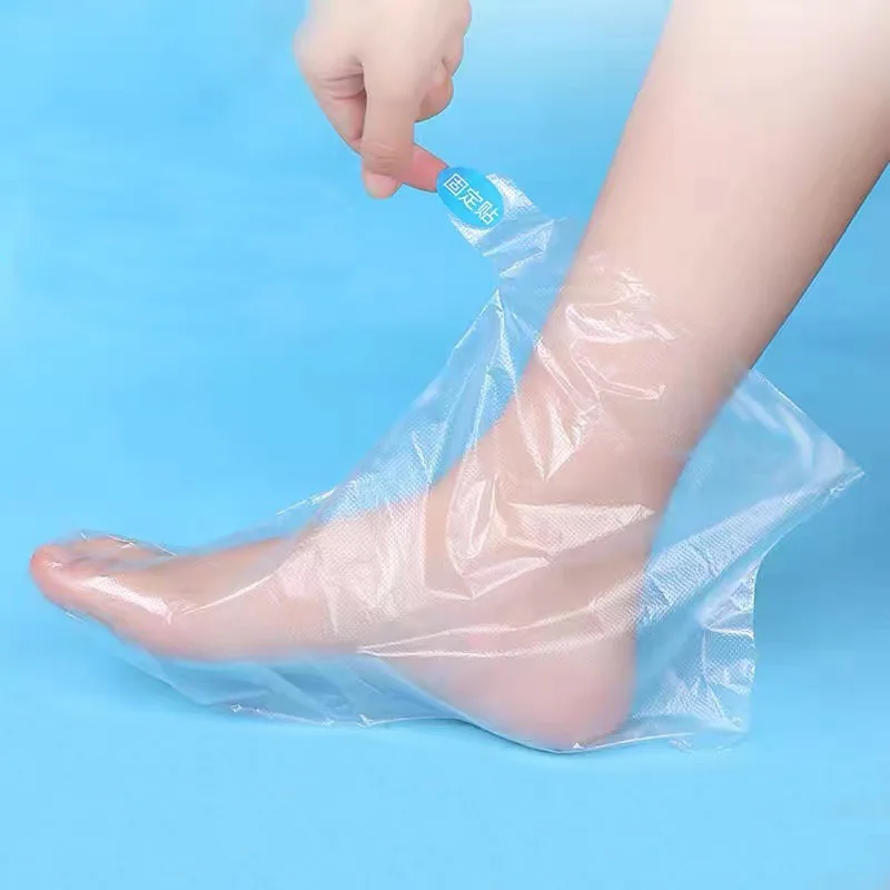 100PCS borse per i piedi usa e getta trasparenti fodera per il bagno Detox SPA coperture in cera strumenti per la cura dei piedi guanti da bagno in paraffina calzini strumento per la cura delle mani