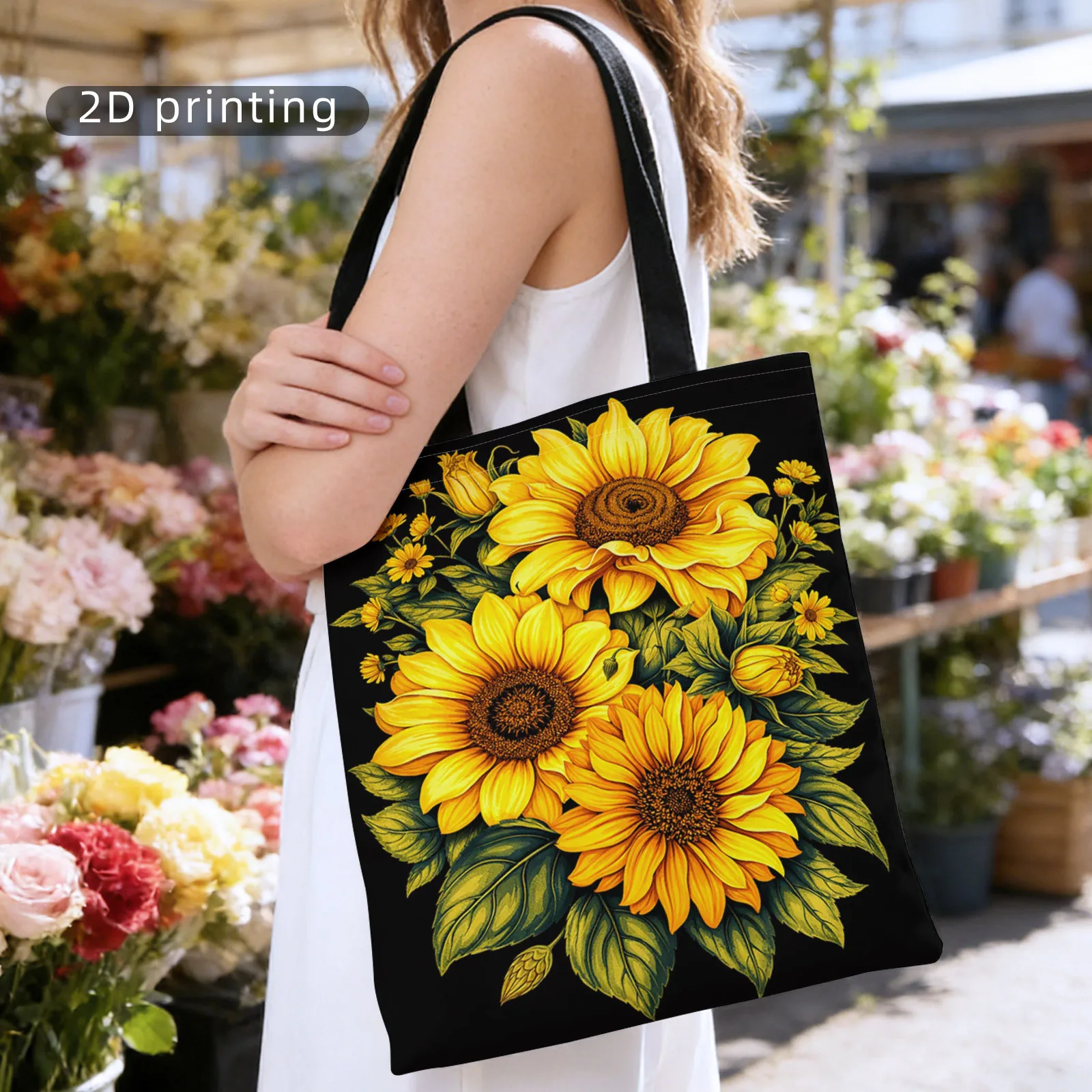 A Patterned Women's Handbag Shoulder Bag, Vibrant Yellow Sunflower Design with Green Leaves on a Black Background.