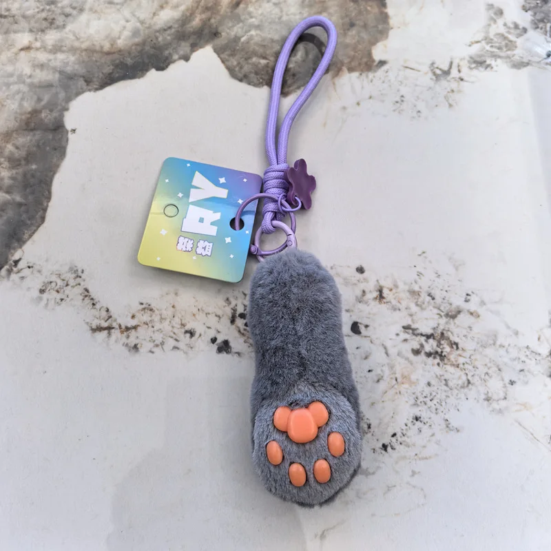 Uroczy Miękki Pluszowy Brelok do Kluczy z Kocimi Łapkami Realistyczna Pluszowa Łapka Kota Wypchana Kawaii Dekoracja do Plecaka Prezent dla Pary
